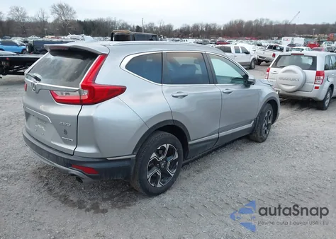 2019 Honda Cr-V Touring z USA, uszkodzony, nr VIN 2HKRW2H96KH604100